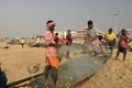 Fishermen checking their net for the fresh catch Royalty Free Stock Photo