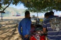 Fishermen cleaning and filleting Royalty Free Stock Photo