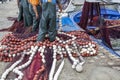 Fishermen cleaning nets and spread 2 Royalty Free Stock Photo