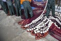 Fishermen cleaning nets Royalty Free Stock Photo