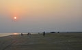 The fishermen collecting fishes and take it towards home in the evening at Baguran Jalpai sea beach near Digha