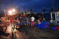 Fishermen are collecting and sorting fisheries after a long day fishing in the Hon Ro seaport, Nha Trang city