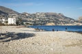 Fishermen at the destroyed beach in Altea after storm Gloria in January 2020 with view on coast, Altea, Costa Blanca, Spain