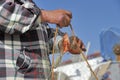 Fishermen detaching red gurnard