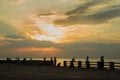 Fishermen fish on the edge of the sea, overnight in the tiling