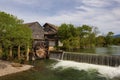 Fishermen fish next to old Mill in Pigeon Forge, Tennessee Royalty Free Stock Photo