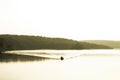 Fishermen on fishing boats use fishing equipment In the arid lagoon. Royalty Free Stock Photo