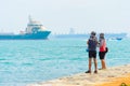 Fishermen fishing harbor tanker Singapore