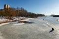 Fishermen fishing on the ice-covered Pekhorka river. City of Balashikha, Moscow region, Russia Royalty Free Stock Photo