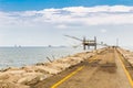 Fishermen and fishing shack on the pier Royalty Free Stock Photo