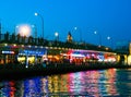 Fishermen on Galata bridge at night