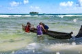 Fishermen with dugout fetch out lobsters and crabs on small island in Caribbean Sea