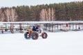 Fishermen go on homemade snowmobile with ice fishing