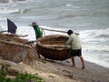 The fishermen have a round boat. Royalty Free Stock Photo