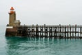 Fishermen on a high wooden pier Royalty Free Stock Photo