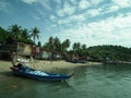 Fishermen houses and fishing boats and pirogues in Pulau Pangkor, Malaysia