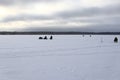 The fishermen on the ice in winter Royalty Free Stock Photo