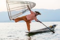 Fishermen in Inle lakes sunset, Myanmar. Royalty Free Stock Photo