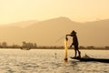 Fishermen in Inle lakes sunset Royalty Free Stock Photo