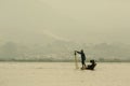 Fishermen in Inle lakes sunset Royalty Free Stock Photo