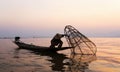 Fishermen in Inle lakes sunset, Myanmar. Royalty Free Stock Photo