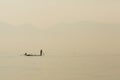 Fishermen in Inle lakes sunset, Myanmar Royalty Free Stock Photo