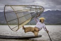 Fishermen in Lake inle - traditional fishing on boat, Myanmar Royalty Free Stock Photo