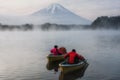 Fishermen at lake Shoji and mount Fuji Royalty Free Stock Photo