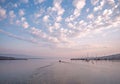 Fishermen leave to collect catches from pots. Royalty Free Stock Photo