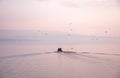 Fishermen leave to collect catches from pots. Royalty Free Stock Photo