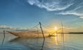 Fishermen mending their nets pm