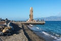 Fishermen near the Athena goddess Statue and Monument to Vittorio Emanuele at Arena