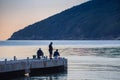 10.10.2019 Montenegro Budva Fishermen on the pier in the early morning. Royalty Free Stock Photo