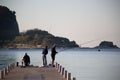 10.10.2019 Montenegro Budva Fishermen on the pier in the early morning. Royalty Free Stock Photo