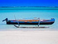 Fishermen pirogue moored on turquoise sea of Nosy Ve island, Indian Ocean, Madagascar