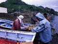 Fishermen prepare their nets in the Black Sea