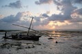 Fishermen preparing their boat to go fishing at sunrise Royalty Free Stock Photo