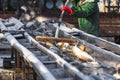 Fishermen in production with their hands pick and sort fish