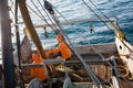 Fishermen pull trawl fish