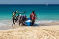 Fishermen pulling a boat ashore, Maio Island, Cape Verde Royalty Free Stock Photo