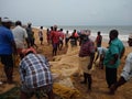 Fishermen pulling fishing net, fishing industry, kerala coast Royalty Free Stock Photo