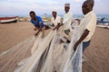 Fishermen pulling a fishing net