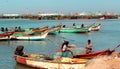 Fishermen at works on the boats in the river arasalaru near karaikal beach. Royalty Free Stock Photo