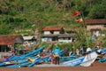 Fishermen are repairing fishing nets, and wooden boats - locations on the coast of Baron, Bantul Indonesia