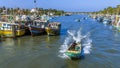 Fishermen rushing to land their catch in the lagoon in Negombo, Sri Lanka