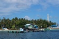 fishermen's halfway house floating above the blue sea, which is usually used to accommodate fish