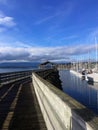 Boardwalk and Blue sky on Fishermen`s Wharf, Comox, BC