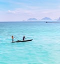 Fishermen sailing on the old traditional zanzibar boat dhow in the sea Royalty Free Stock Photo