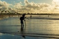 Fishermen are seen fishing during dawn on Jaguaribe beach in the city of Salvador, Bahia Royalty Free Stock Photo