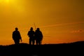 Silhouettes of three fishermen Royalty Free Stock Photo